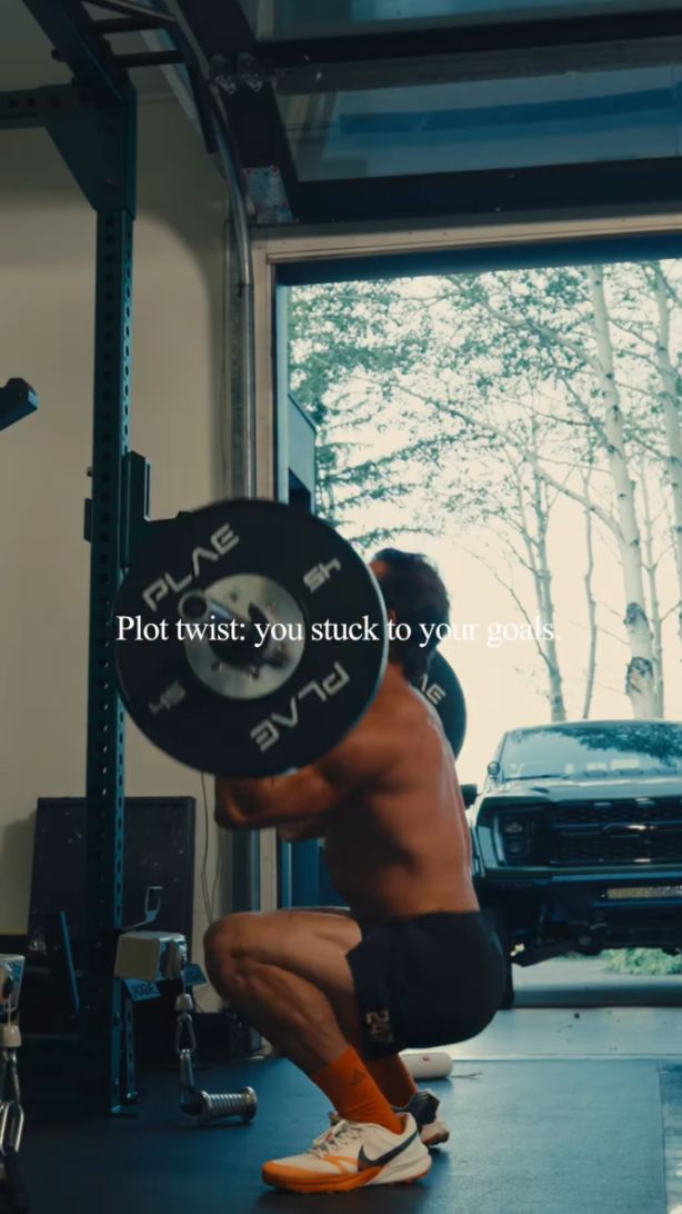 Greg LaV reel: white serif line "Plot twist: you stuck to your goals." over gym footage